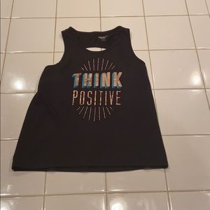 Twist back running tank
